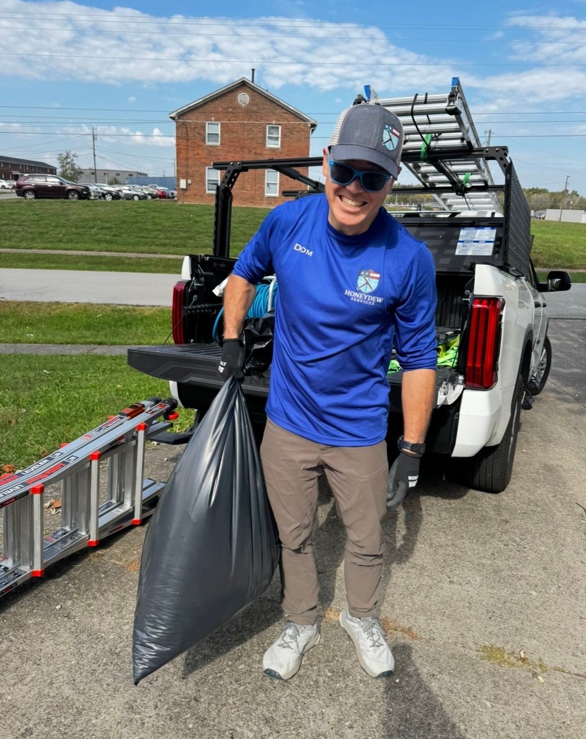 Window cleaning service removing water stains and grime