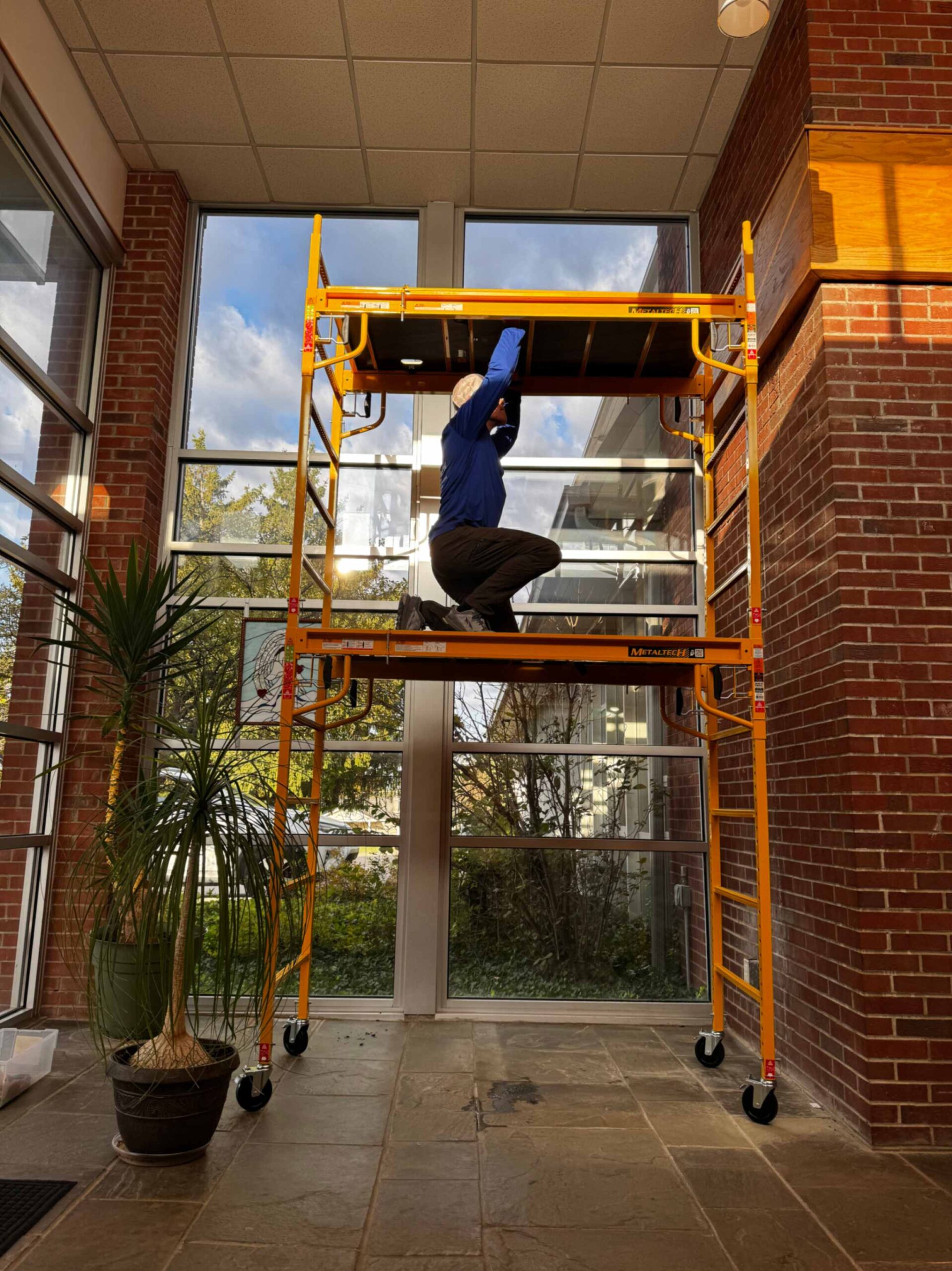 Exterior house washing removing dirt and mold buildup